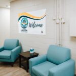 Main entrance and warm, friendly lobby area inside facility