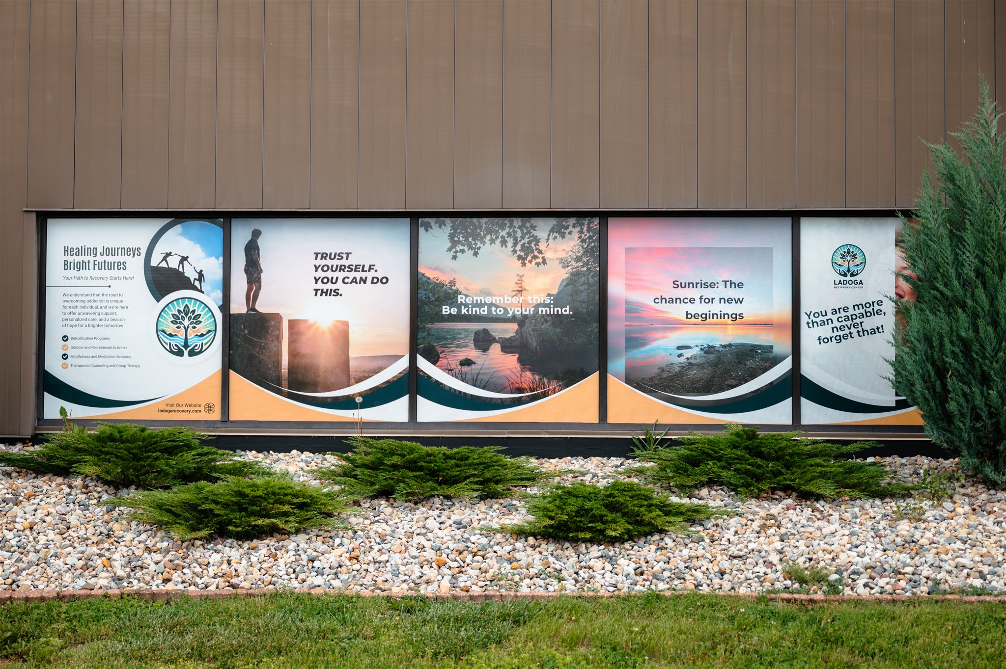 Outside of Ladoga Recovery Building with motivational artwork along the walls